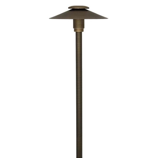 A modern outdoor patio stake lamp with a tapered metal shade and a long cylindrical pole, finished in a dark bronze color, shown against a plain white background.